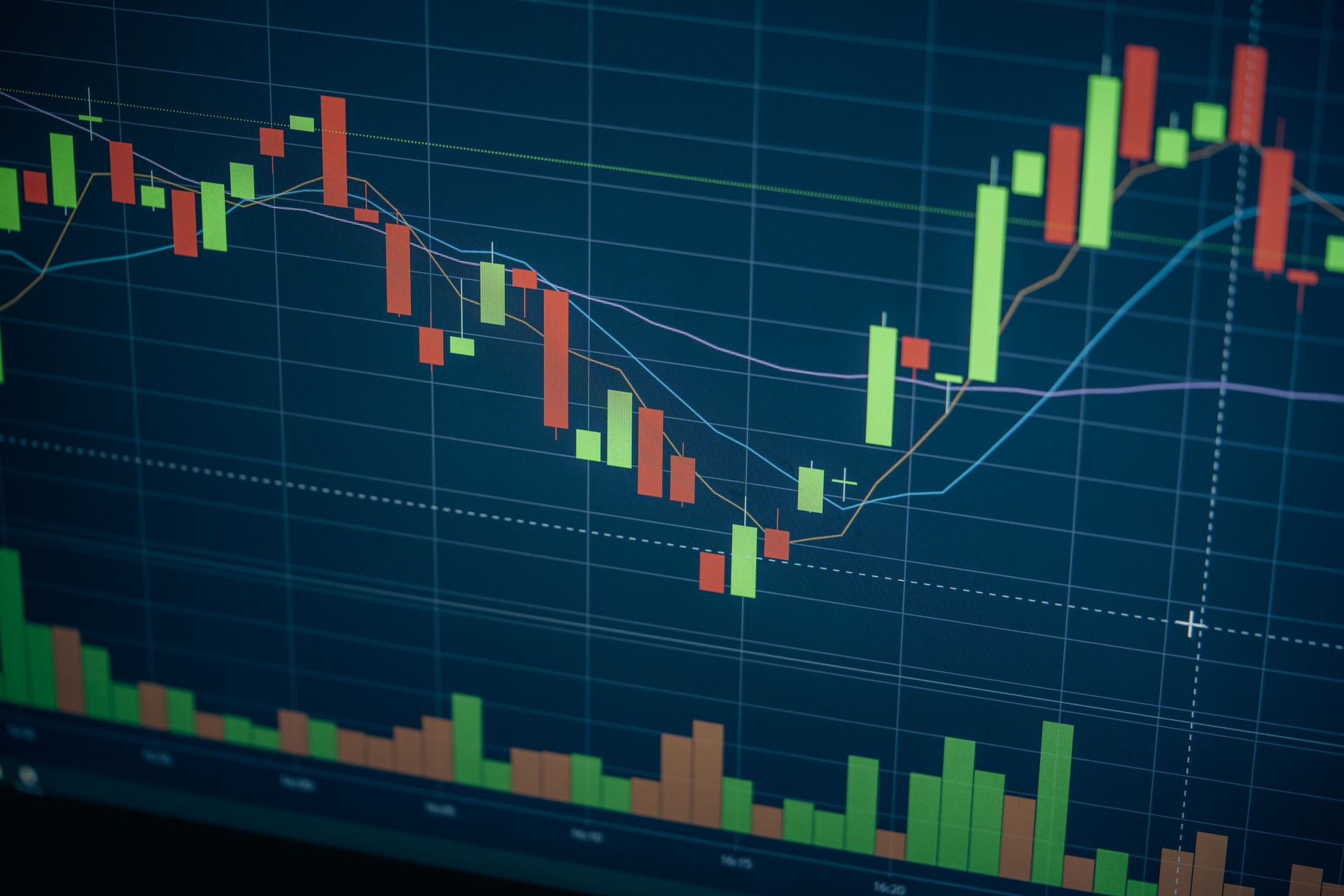 Digital screen with financial trading chart and cryptocurrency price trend.